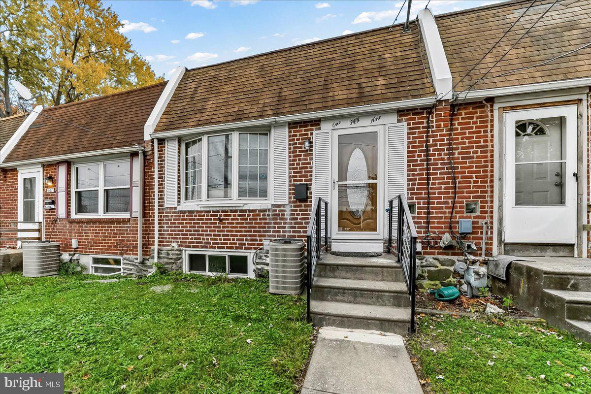 159 Chadwick Avenue Linwood, PA 19061 - Photo 35 of 35 a front view of a house with garden
