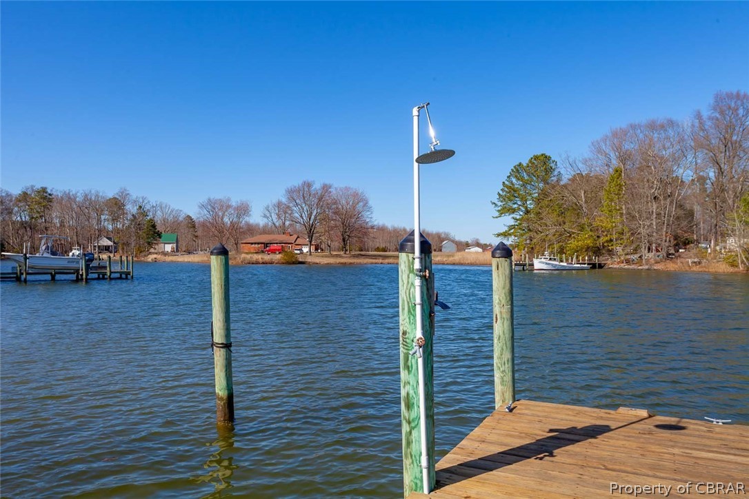 111 Pilot House Lane Reedville, VA 22539 - Photo 10 of 50 Outdoor shower...hose off before heading inside!
