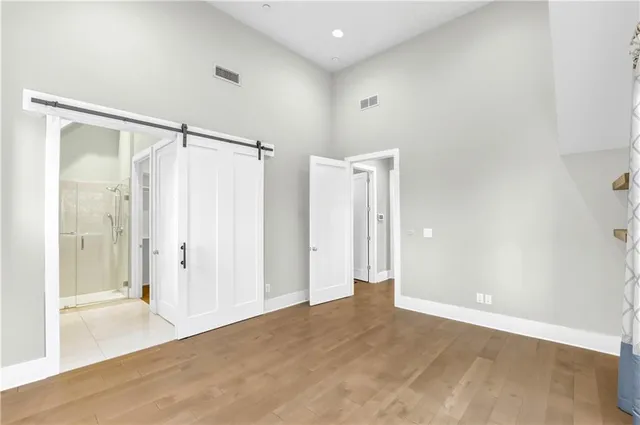 a bathroom with a double vanity sink mirror double and shower