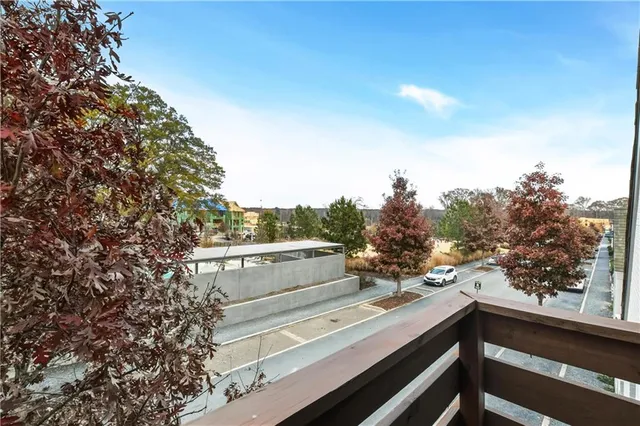 a view of an empty room with a fireplace