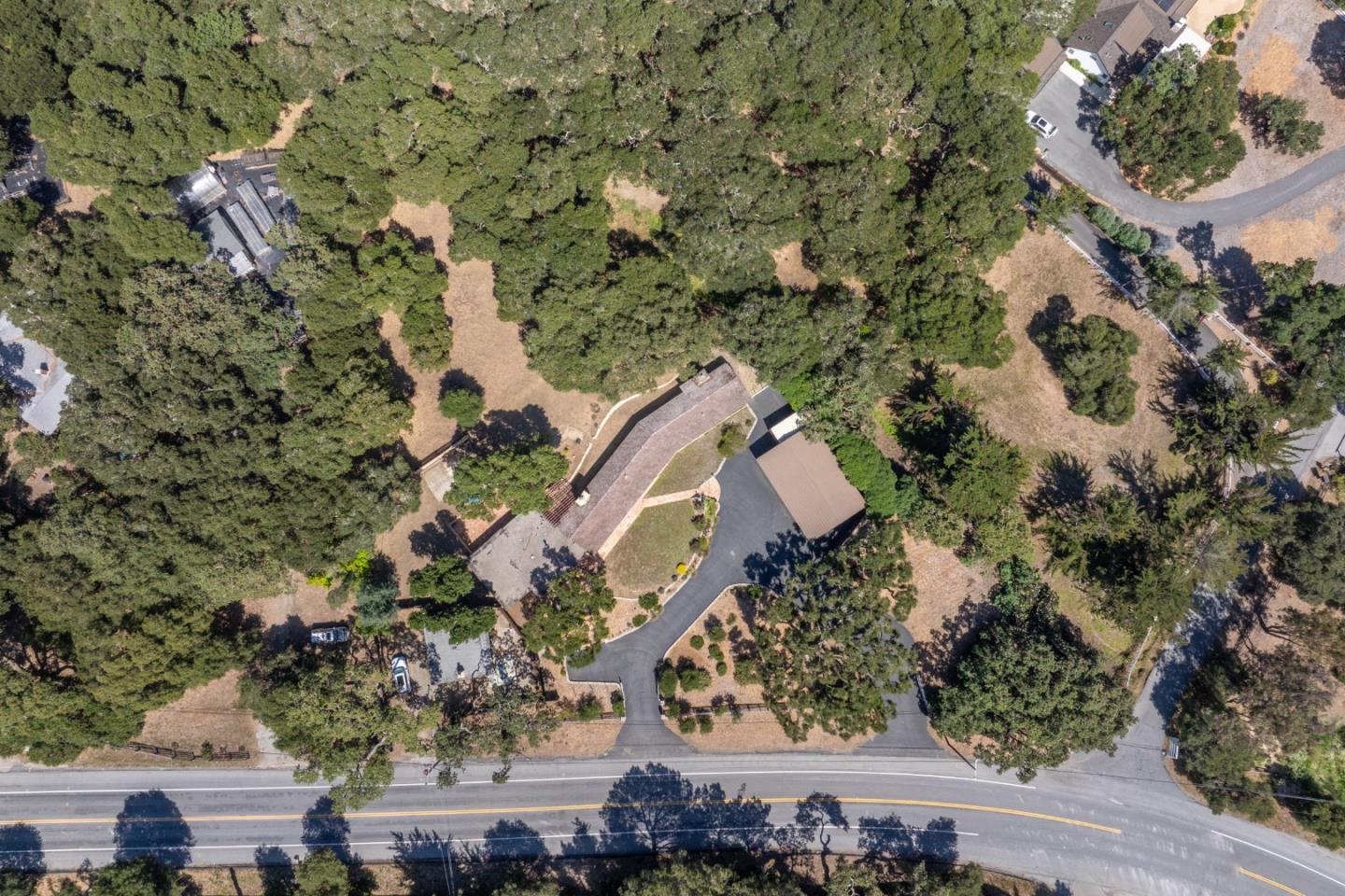 72 Los Laureles Grade Road Carmel Valley, CA 93924 - Photo 42 of 43 an aerial view of house with yard