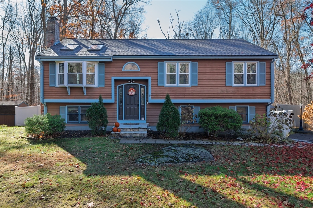 12 Hickory Road Millville, MA 01529 - Photo 2 of 41 a view of a brick house with a yard plants and large tree