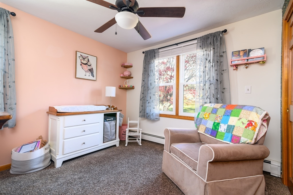 12 Hickory Road Millville, MA 01529 - Photo 23 of 41 a bedroom with a bed and a window
