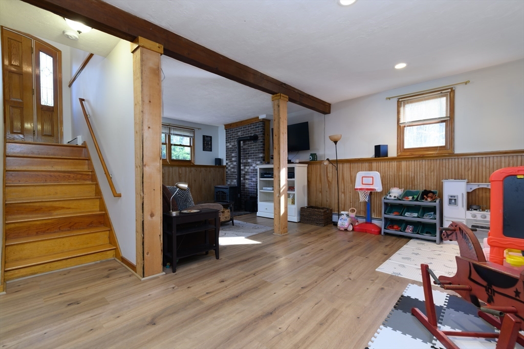 12 Hickory Road Millville, MA 01529 - Photo 27 of 41 a view of a livingroom with workspace and a window