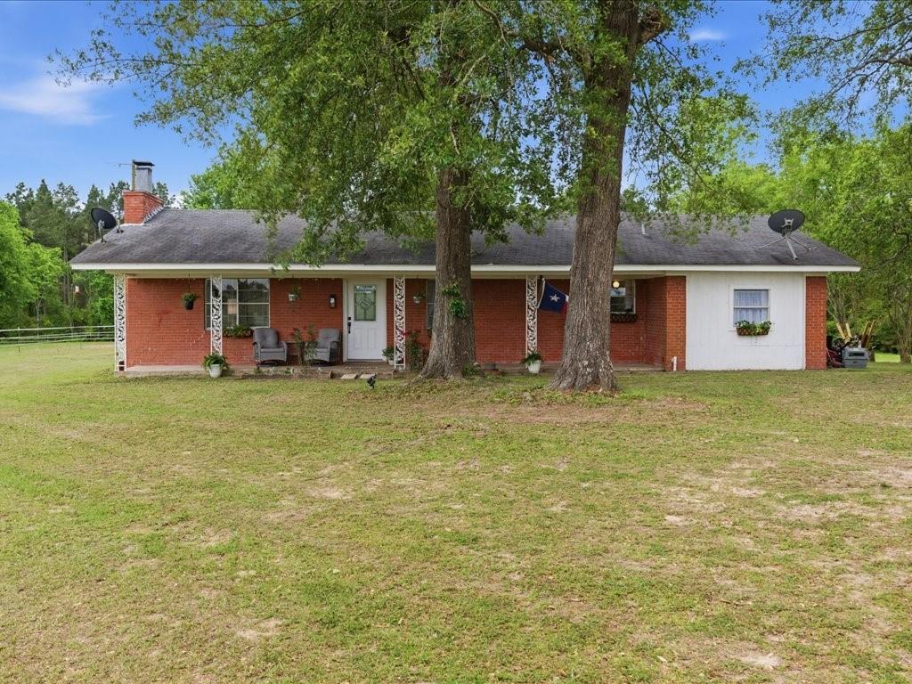 1085 Duke Road Kennard, TX 75847 - Photo 37 of 40 Ranch-style exterior featuring red brick siding and white trim