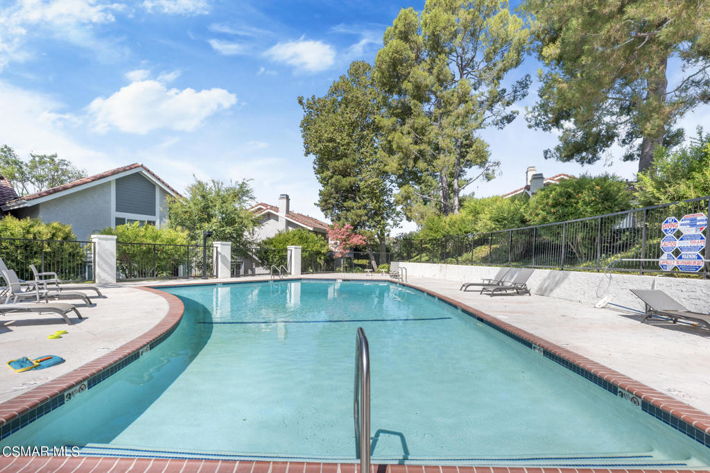 932 Thistlegate Road Oak Park, CA 91377 - Photo 23 of 25 a view of a swimming pool with a patio