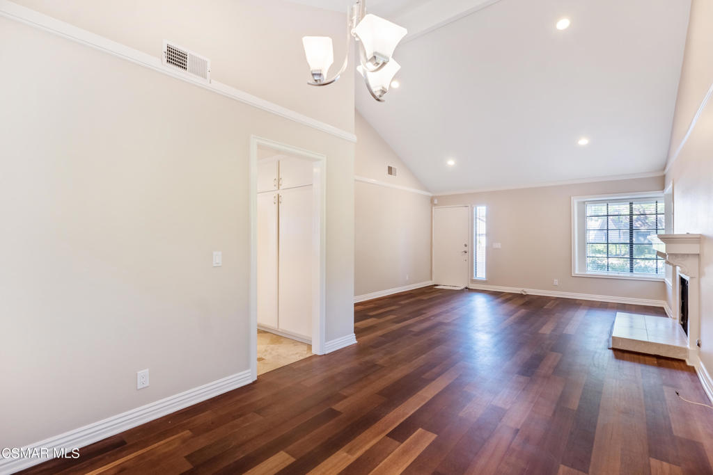 932 Thistlegate Road Oak Park, CA 91377 - Photo 8 of 25 a view of livingroom with hardwood floor and window