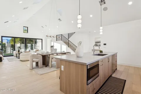 a kitchen with a sink and stove
