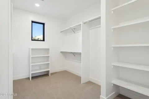 a white bath tub sitting next to a window
