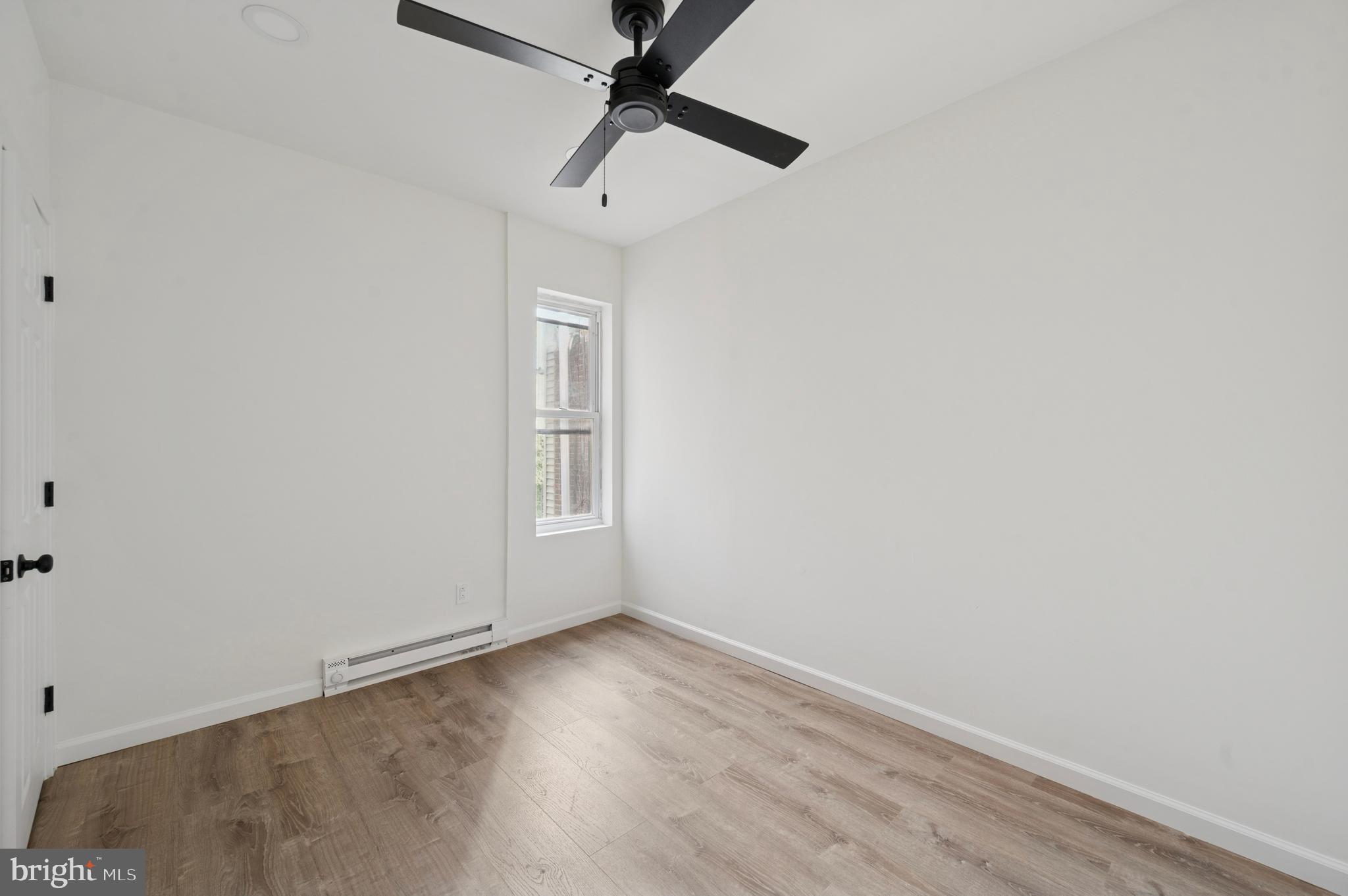 5929 Spring Street Philadelphia, PA 19139 - Photo 12 of 15 wooden floor in an empty room