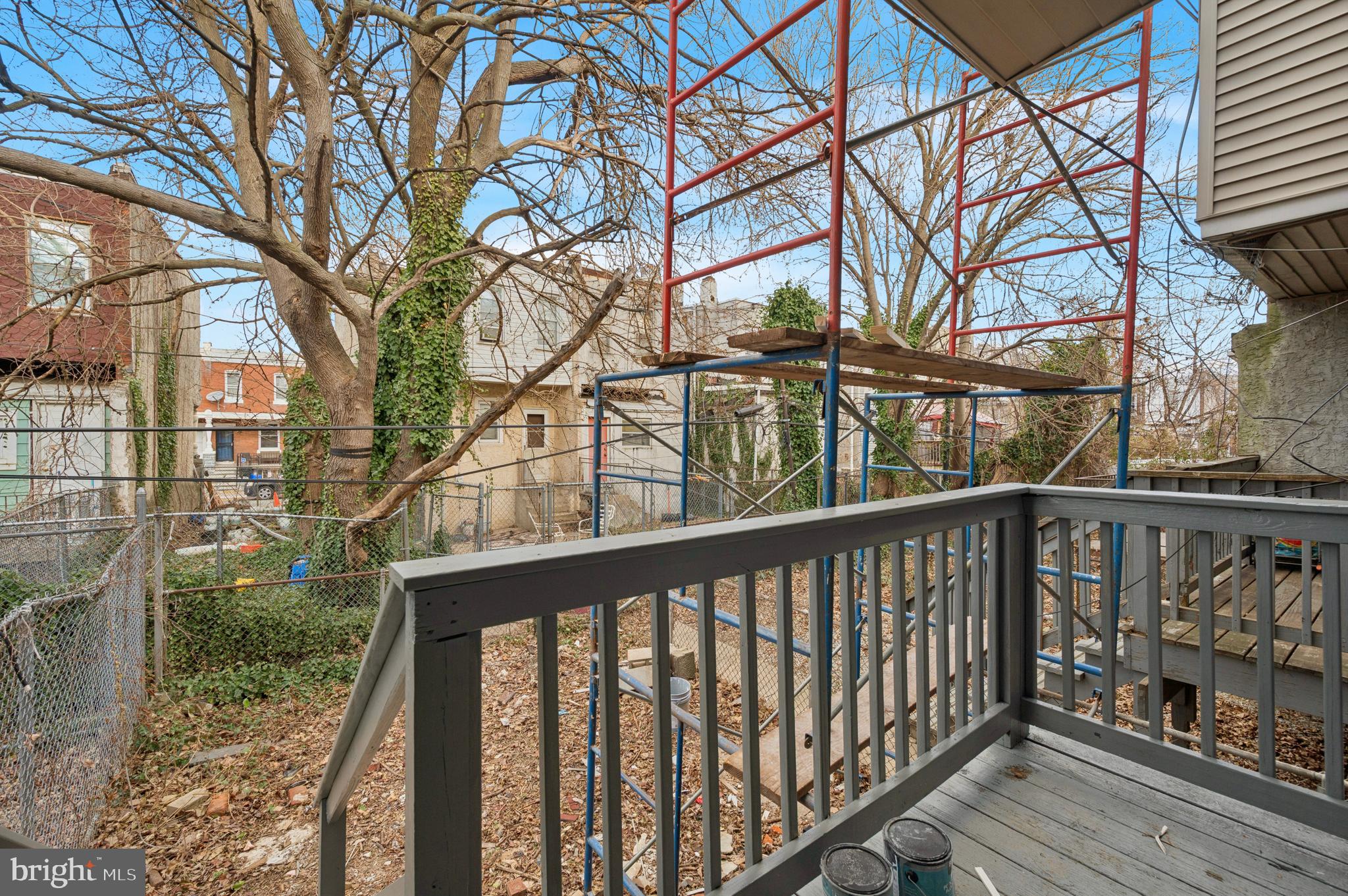5929 Spring Street Philadelphia, PA 19139 - Photo 15 of 15 a view of roof deck with wooden fence and floor