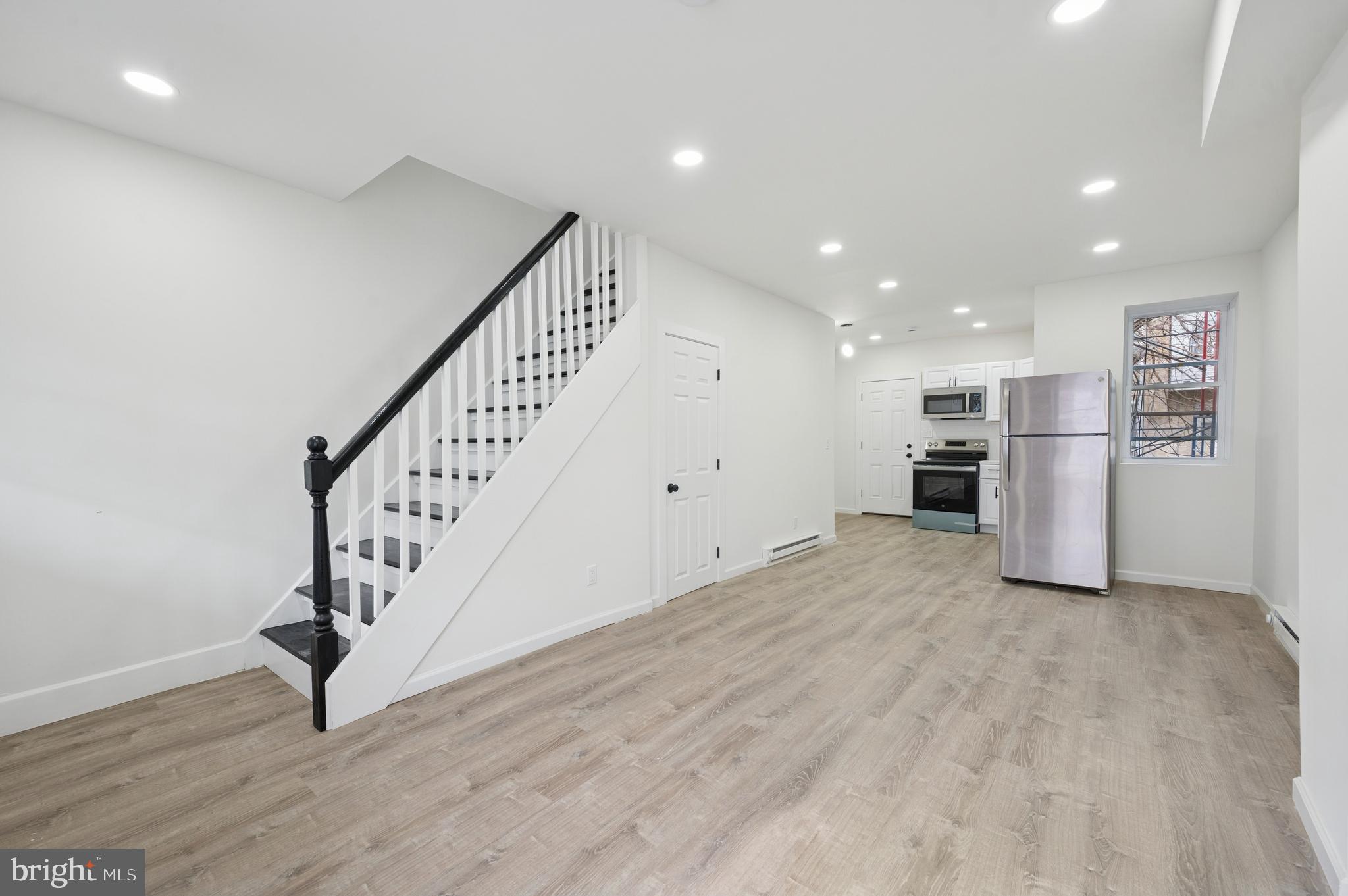 5929 Spring Street Philadelphia, PA 19139 - Photo 3 of 15 a view of kitchen with furniture and refrigerator