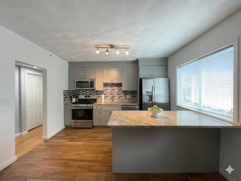48 Derby Street, Unit 1 Somerville, MA 02145 - Photo 1 of 10