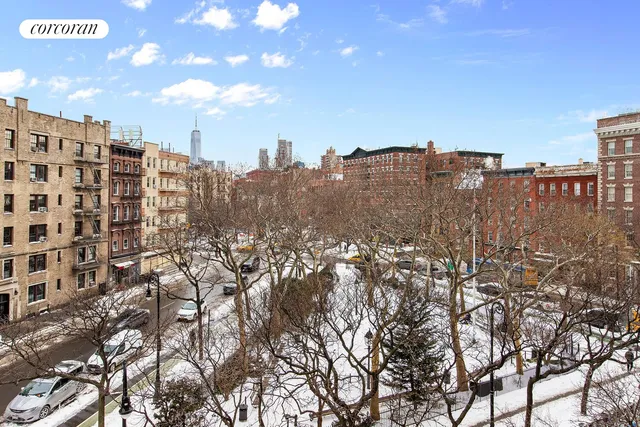 a view of a city with tall buildings
