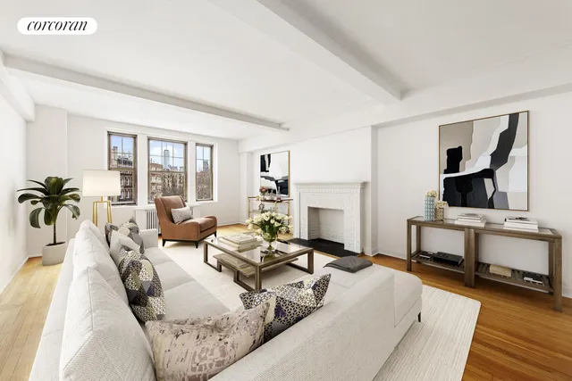 a living room with furniture fireplace and a table