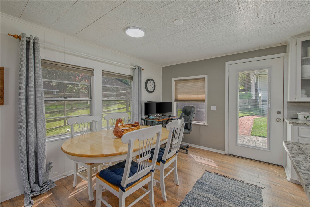11001 Clyde Acord Road Franklin, TX 77856 - Photo 14 of 43 a dining room with furniture and wooden floor