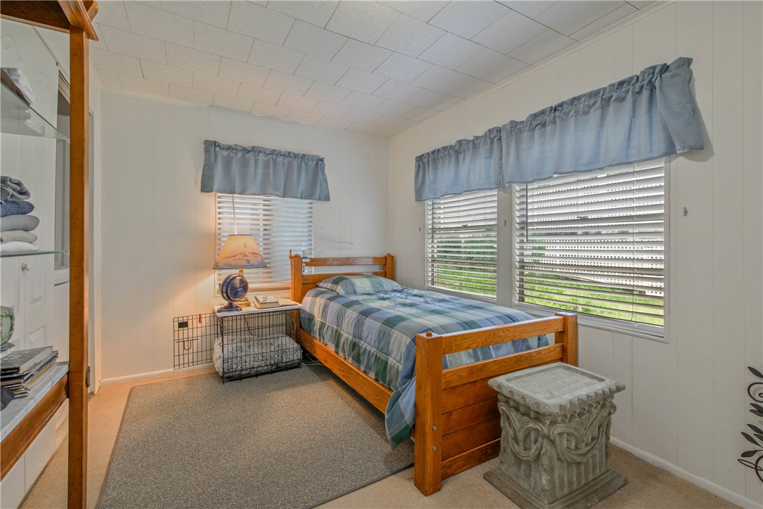 11001 Clyde Acord Road Franklin, TX 77856 - Photo 18 of 43 a bedroom with a bed and a window