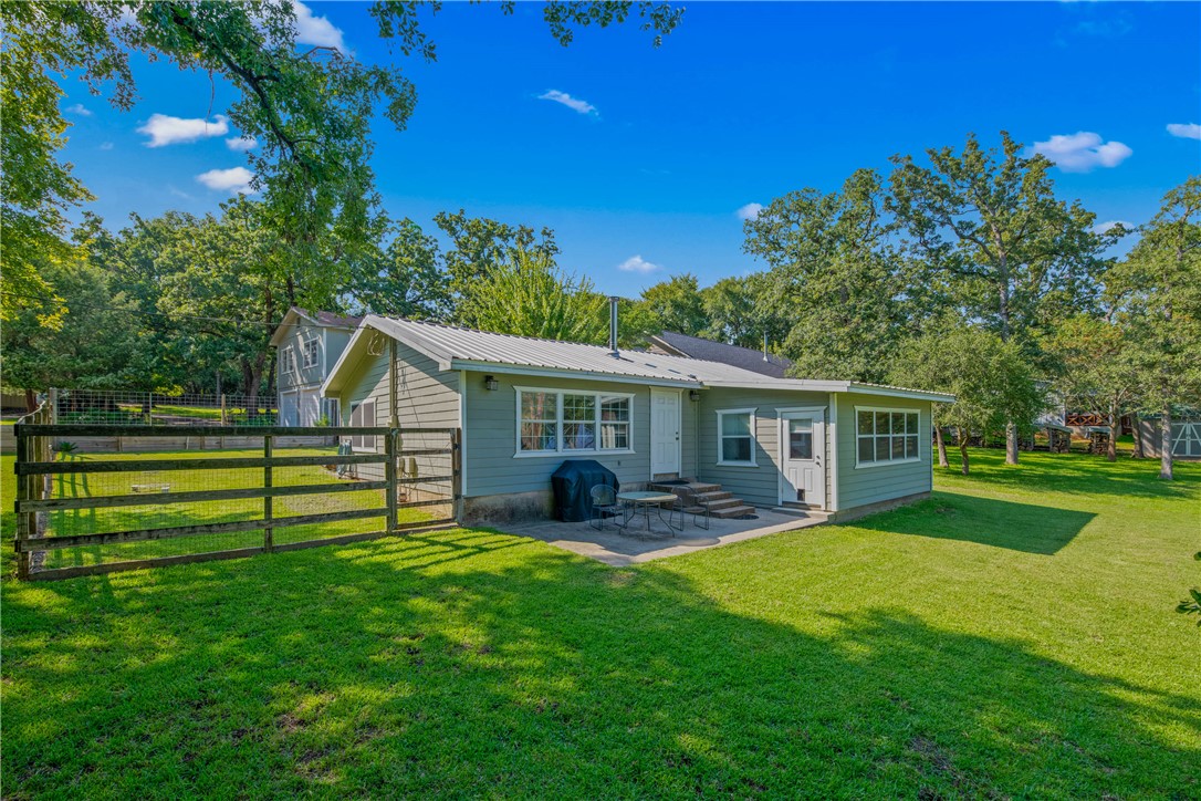 11001 Clyde Acord Road Franklin, TX 77856 - Photo 22 of 43 a view of a house with a yard porch and sitting area