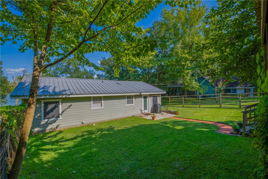 11001 Clyde Acord Road Franklin, TX 77856 - Photo 34 of 43 a house view with a sitting space and garden