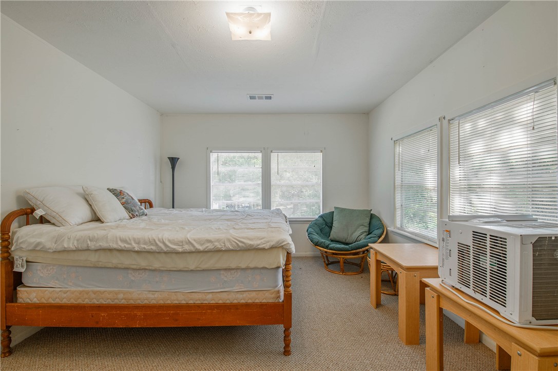 11001 Clyde Acord Road Franklin, TX 77856 - Photo 38 of 43 a bedroom with a bed and a window