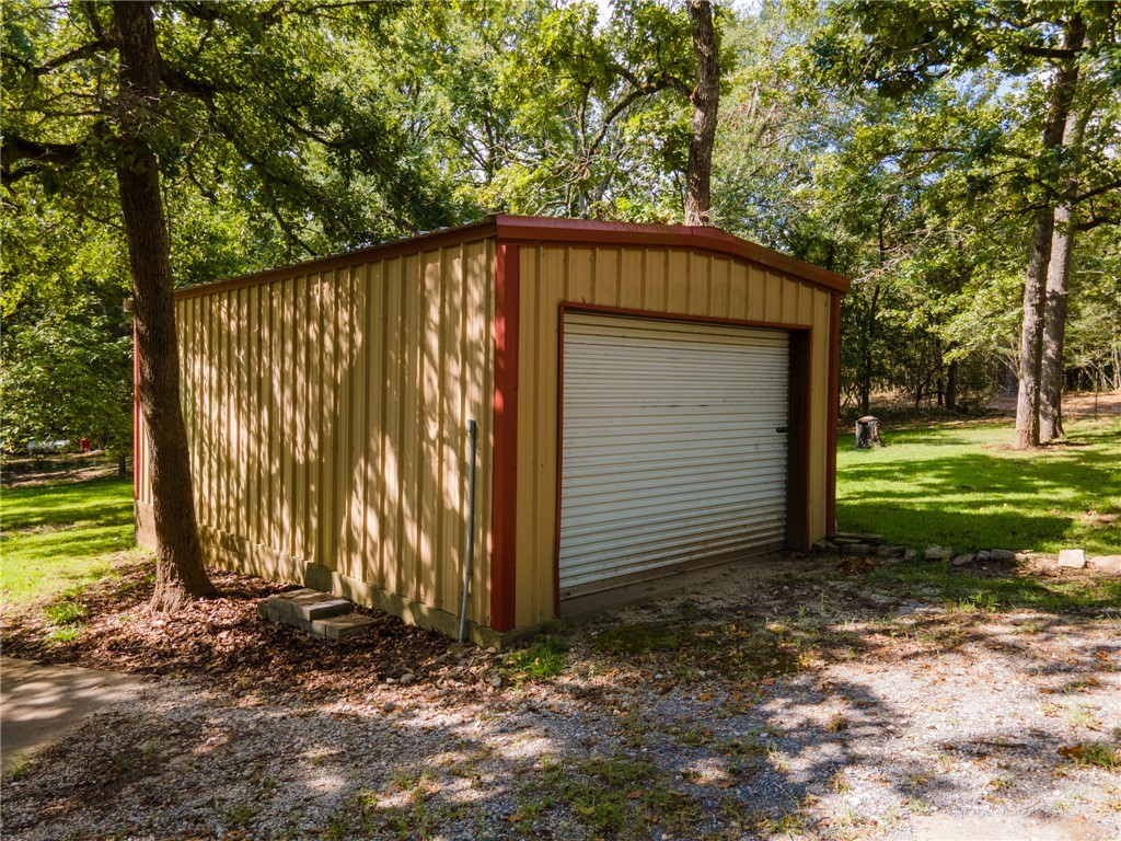 11001 Clyde Acord Road Franklin, TX 77856 - Photo 43 of 43 a view of a house with backyard and tree