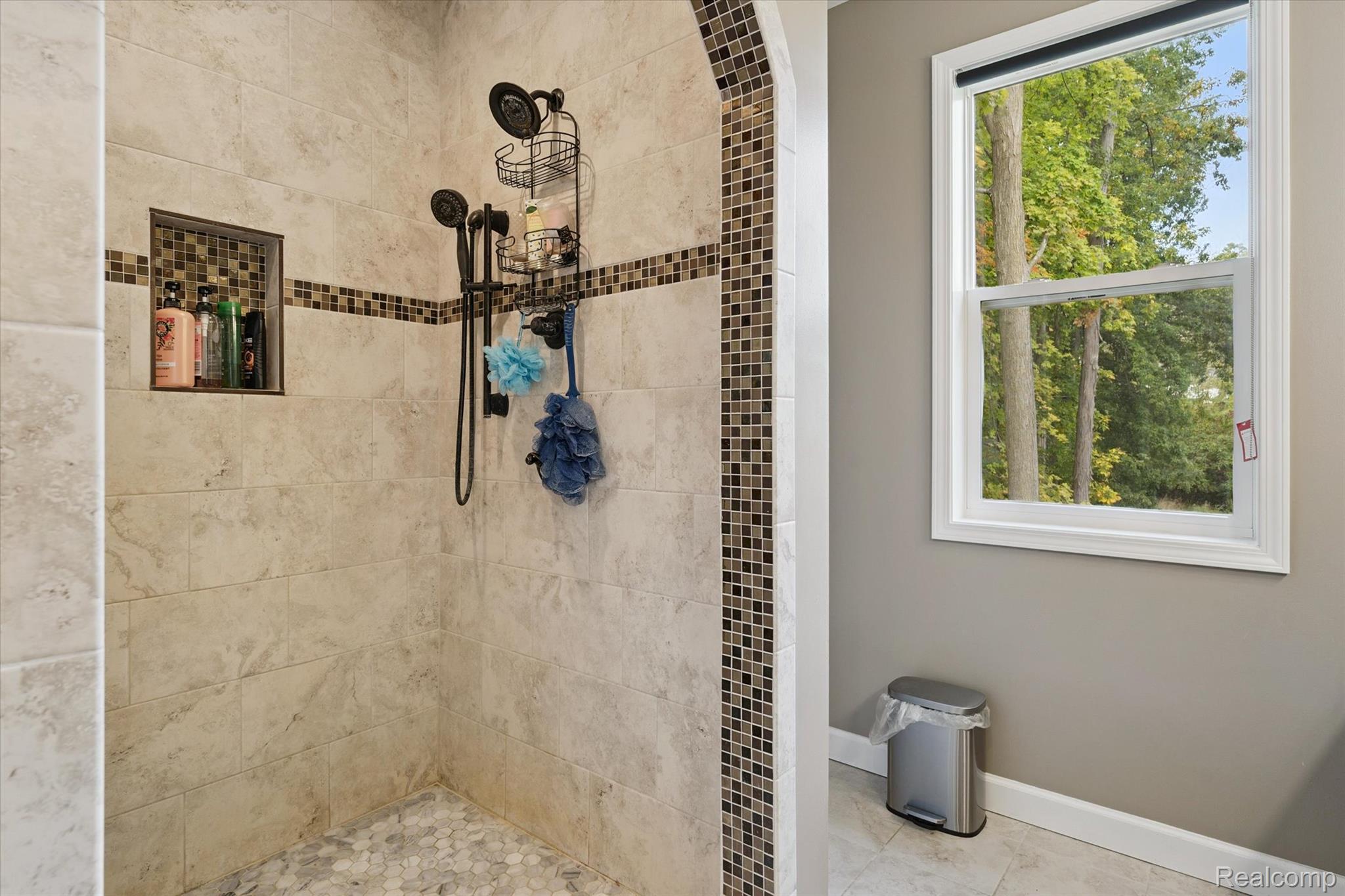 441 West Dryden Road Metamora, MI 48455 - Photo 32 of 62 Bathroom featuring healthy amount of natural light, a tile shower, and tile patterned floors