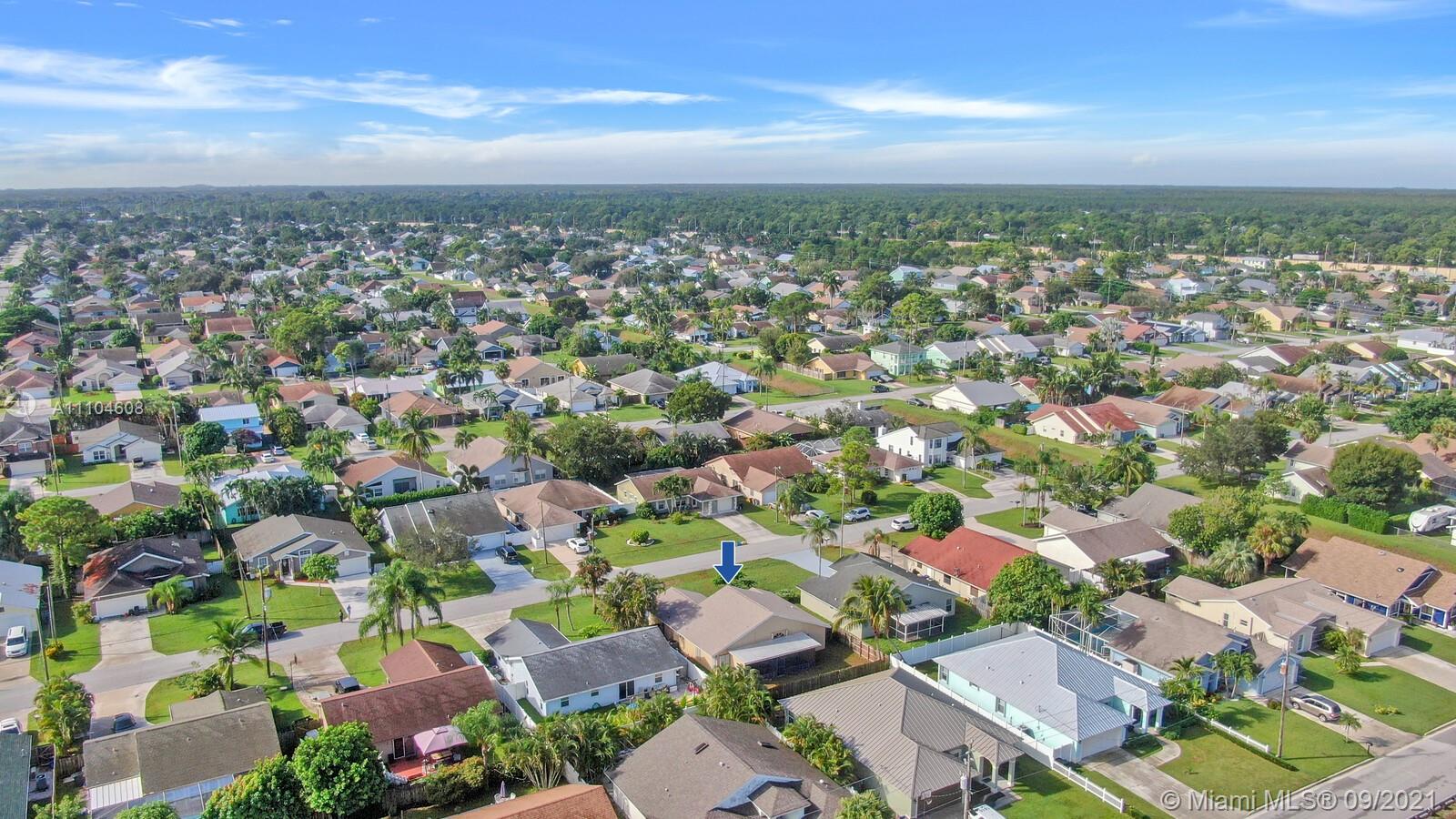 6247 Robinson Street Jupiter, FL 33458 - Photo 40 of 56 an aerial view of a city