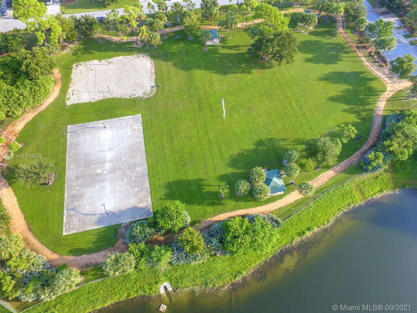 6247 Robinson Street Jupiter, FL 33458 - Photo 56 of 56 an aerial view of a residential houses with outdoor space and street view