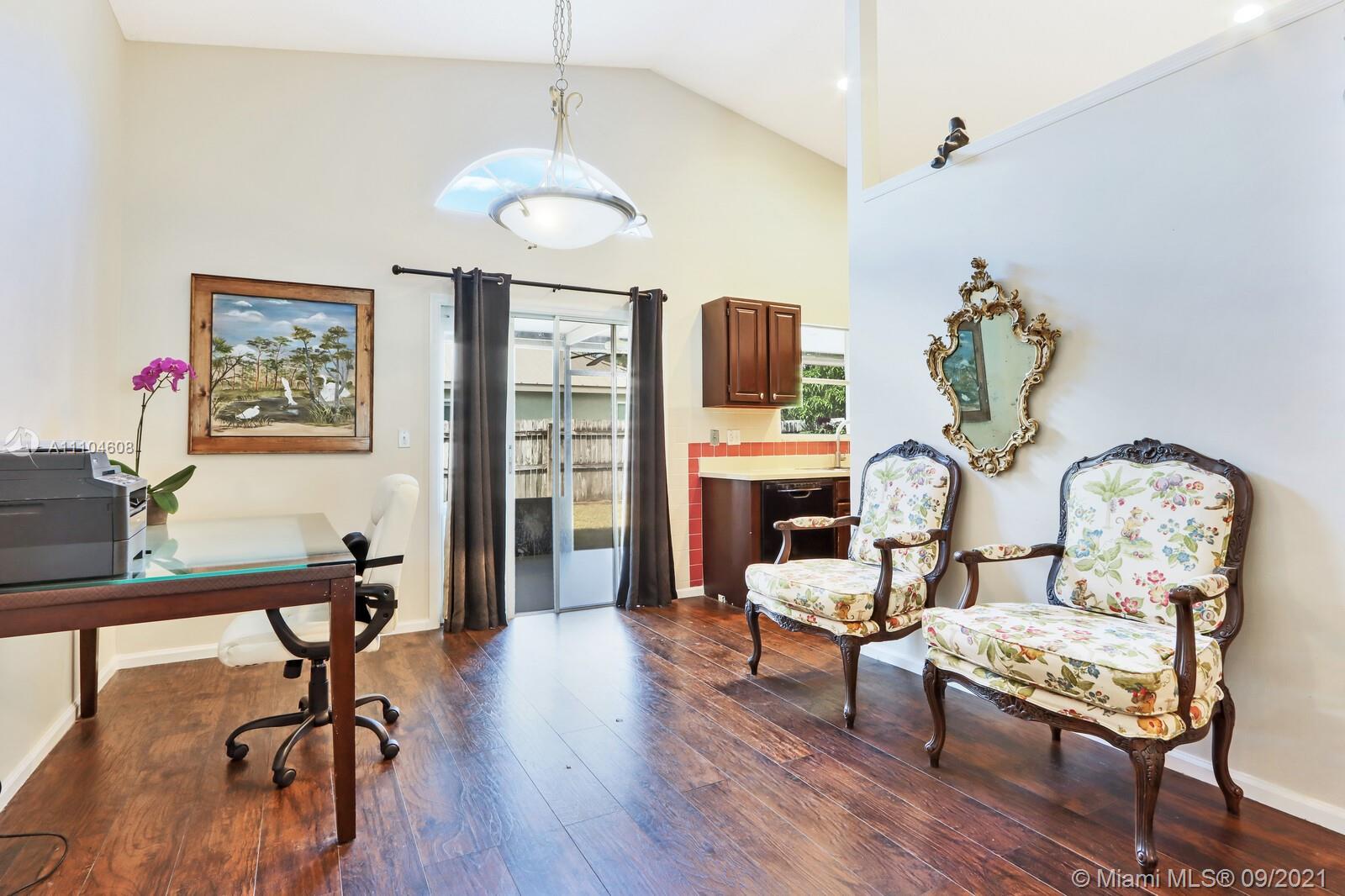 6247 Robinson Street Jupiter, FL 33458 - Photo 10 of 56 a living room with furniture