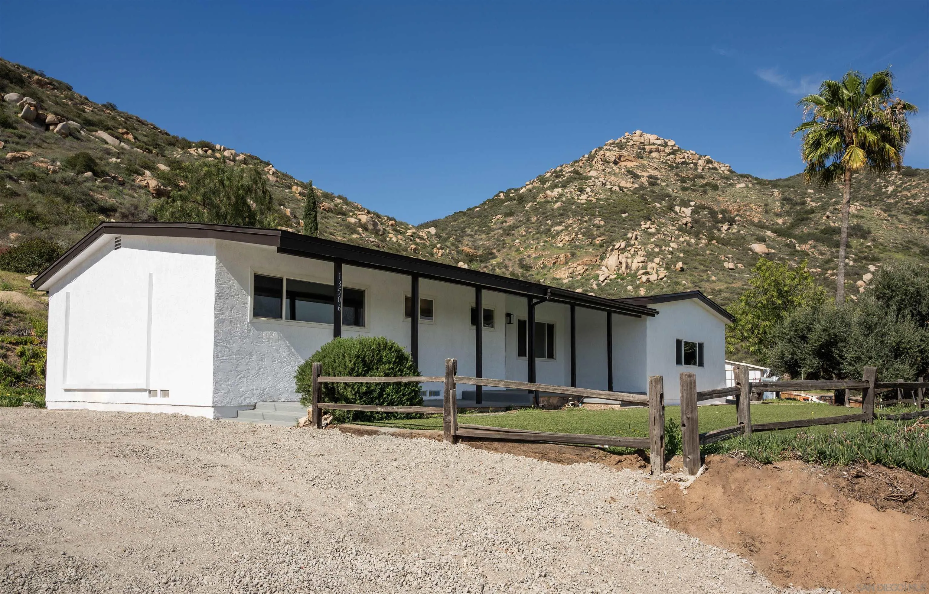13504 Willow Road Lakeside, CA 92040 - Photo 2 of 9 a front view of a house with garden
