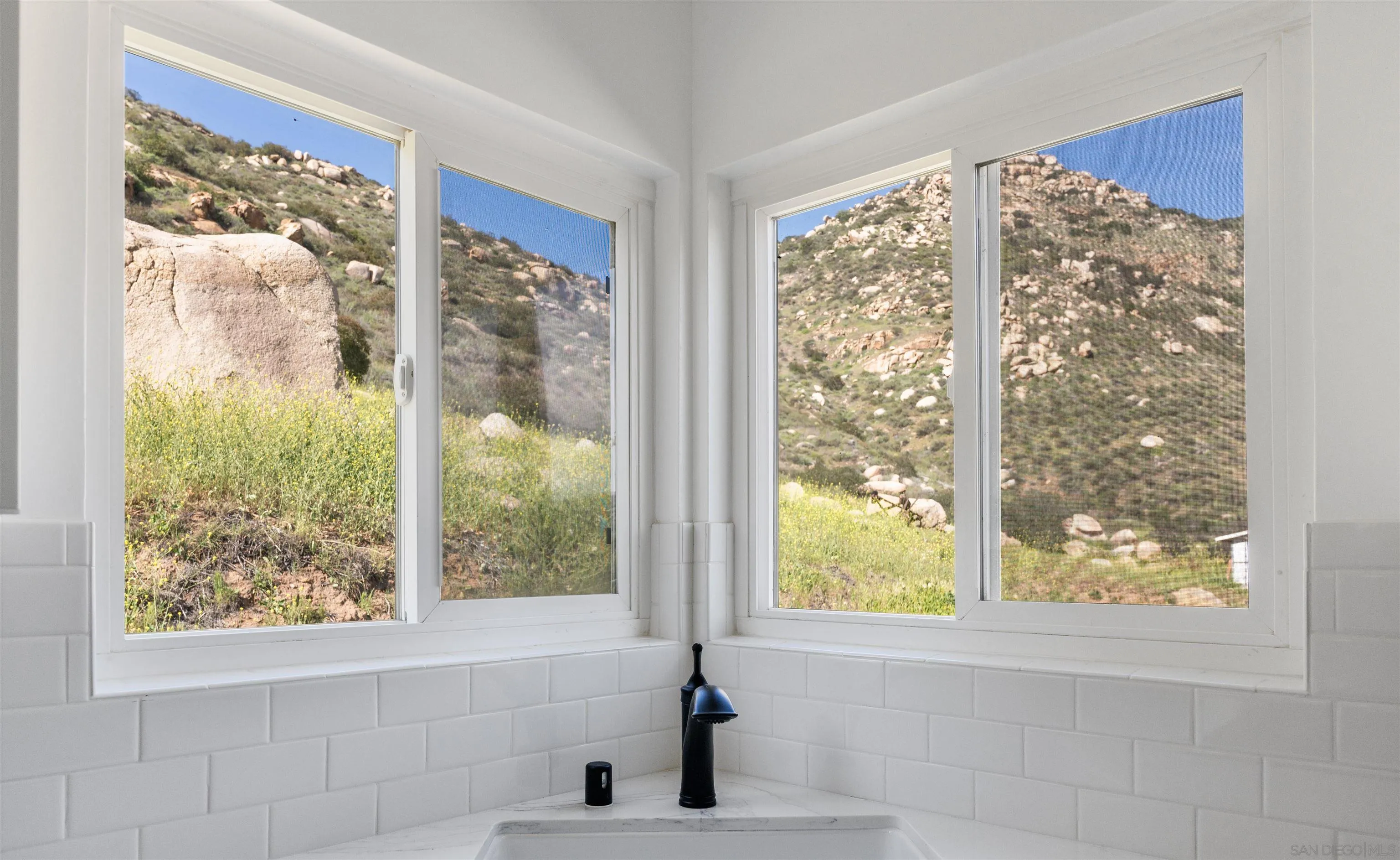 13504 Willow Road Lakeside, CA 92040 - Photo 5 of 9 a bathroom with a large window
