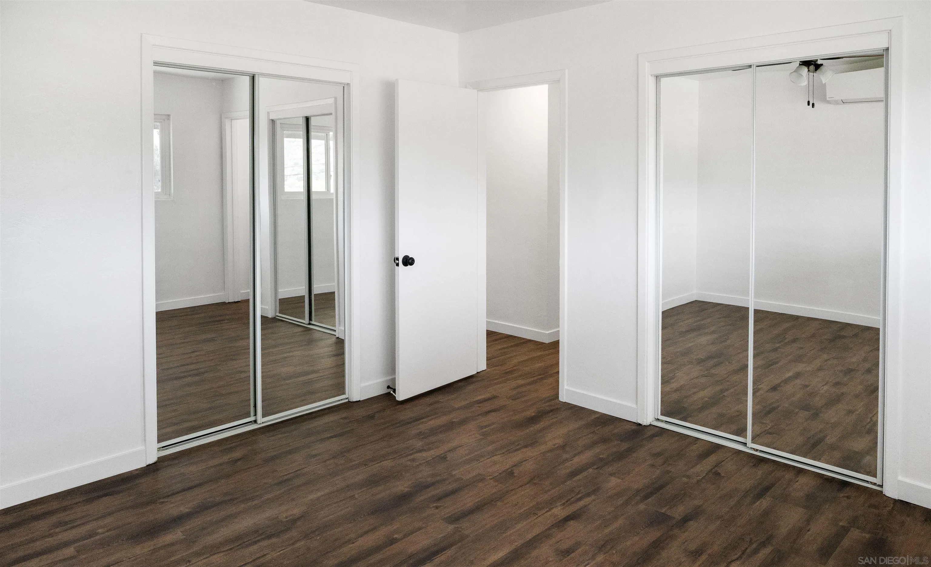 13504 Willow Road Lakeside, CA 92040 - Photo 6 of 9 a view of empty room with wooden floor