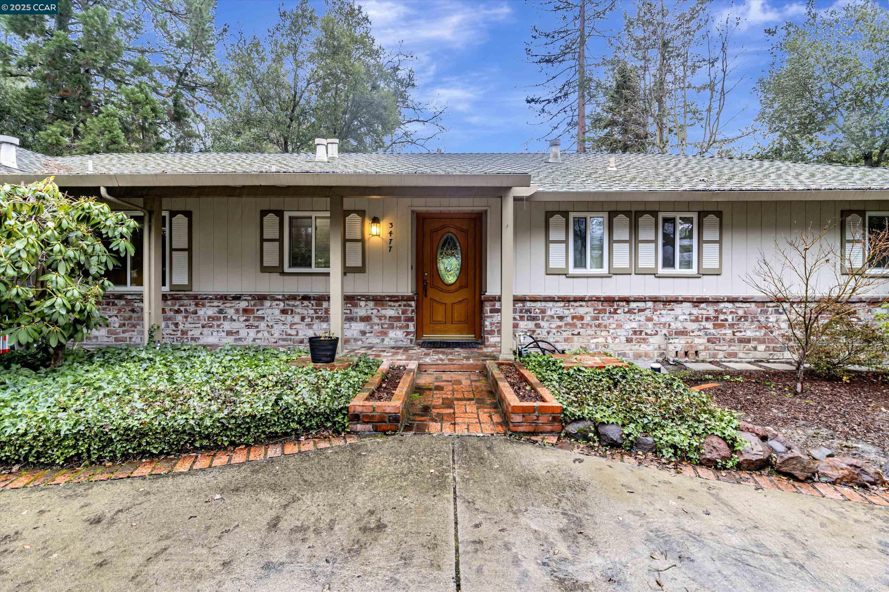 3477 St Marys Road Lafayette, CA 94549 - Photo 1 of 1 a front view of a house
