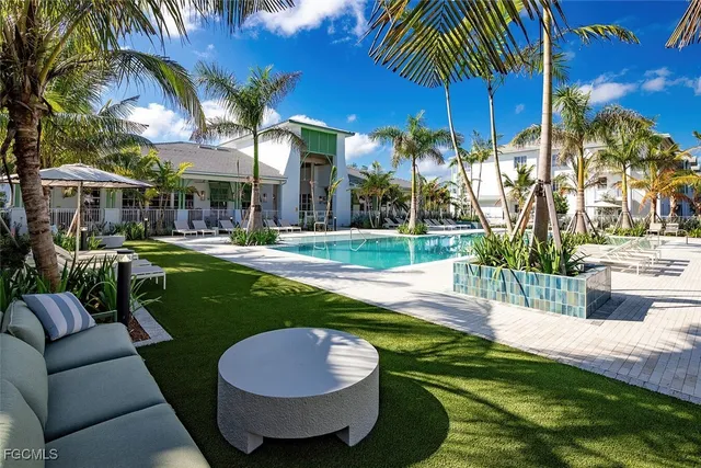 a view of a patio with swimming pool