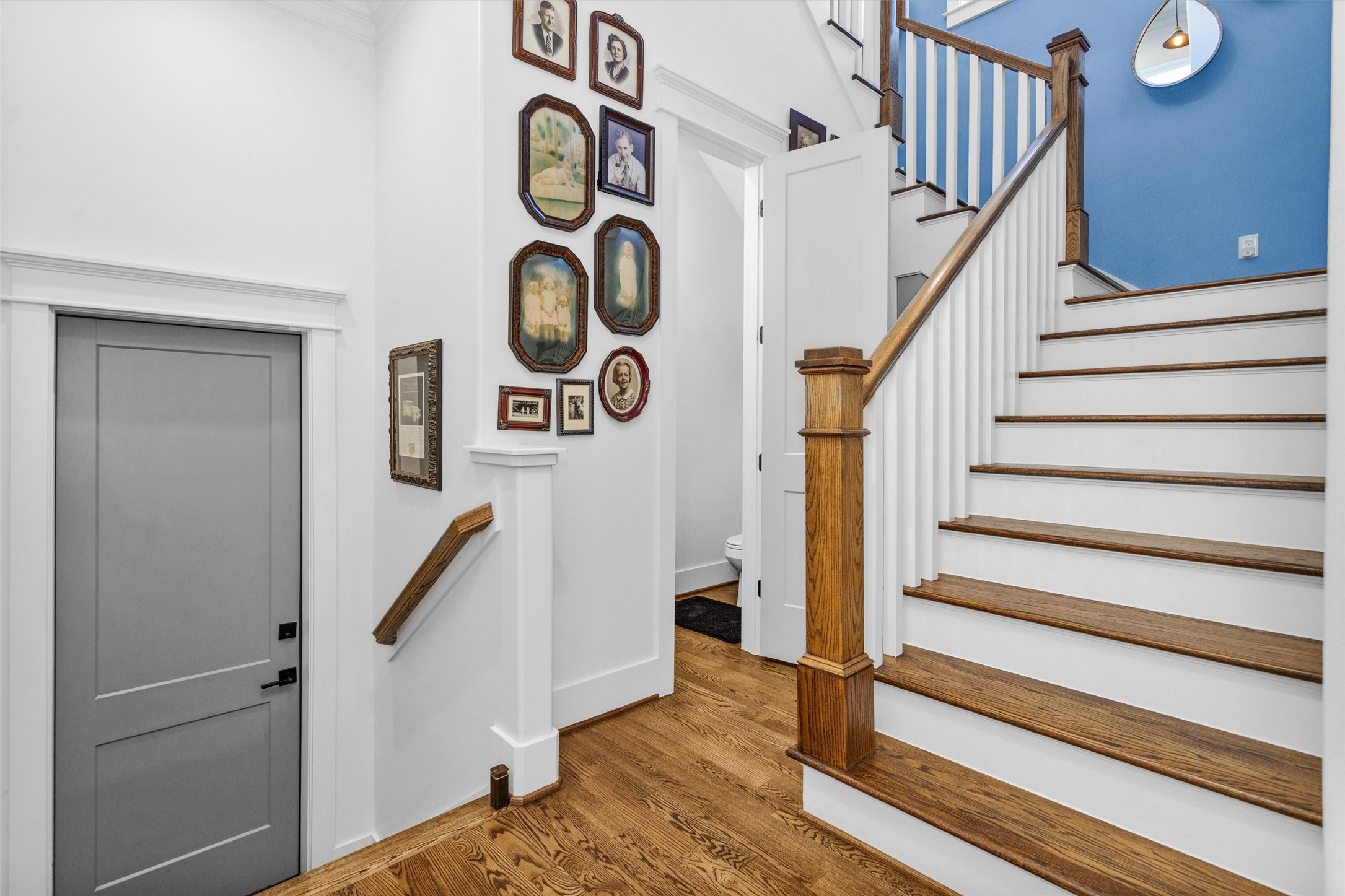 1202 Walton Street Houston, TX 77009 - Photo 17 of 32 Striking Staircase Adding Character and Charm to the Home