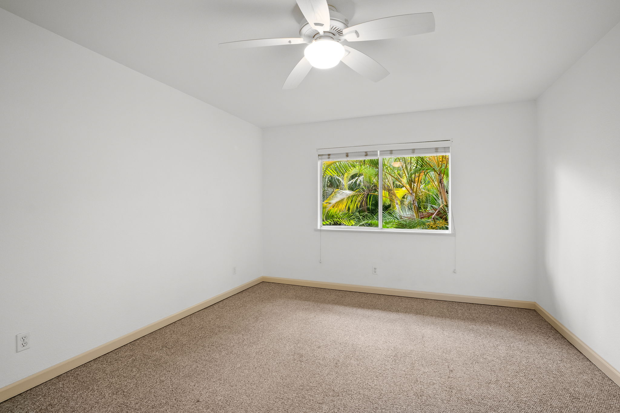 1831 Poipu Road, Unit 324 Koloa, HI 96756 - Photo 8 of 10 an empty room with a window