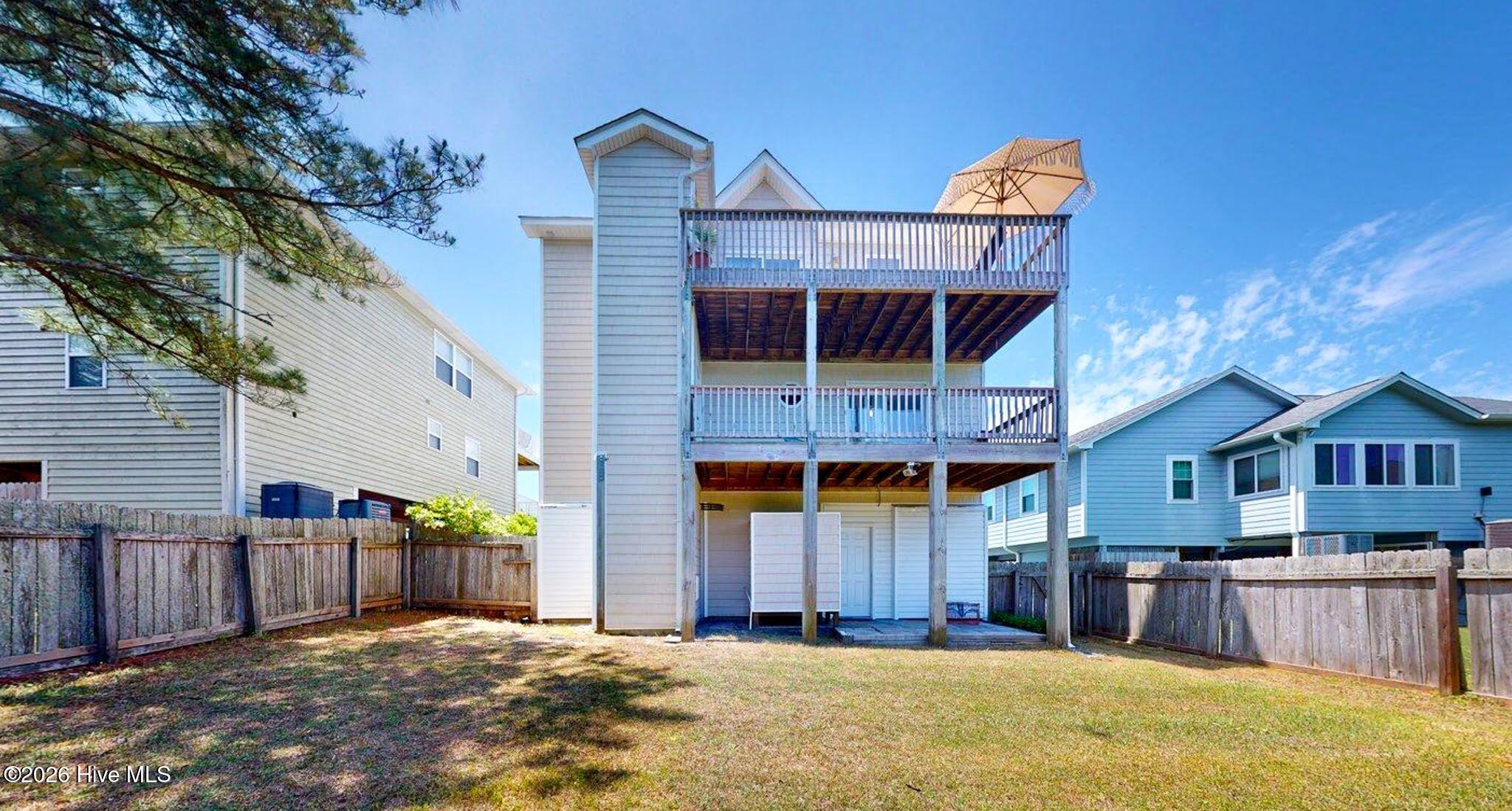 58 N Ridge Surf City, NC 28445 - Photo 37 of 50 Back fenced lawn