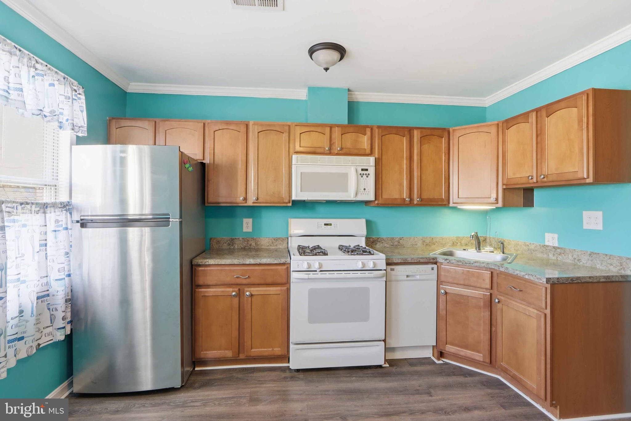 3547 Benzinger Road Baltimore, MD 21229 - Photo 12 of 24 Bright kitchen with modern appliances.