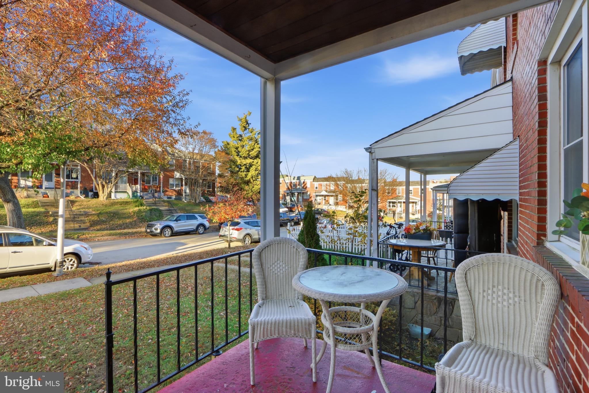 Charming porch with autumn views.