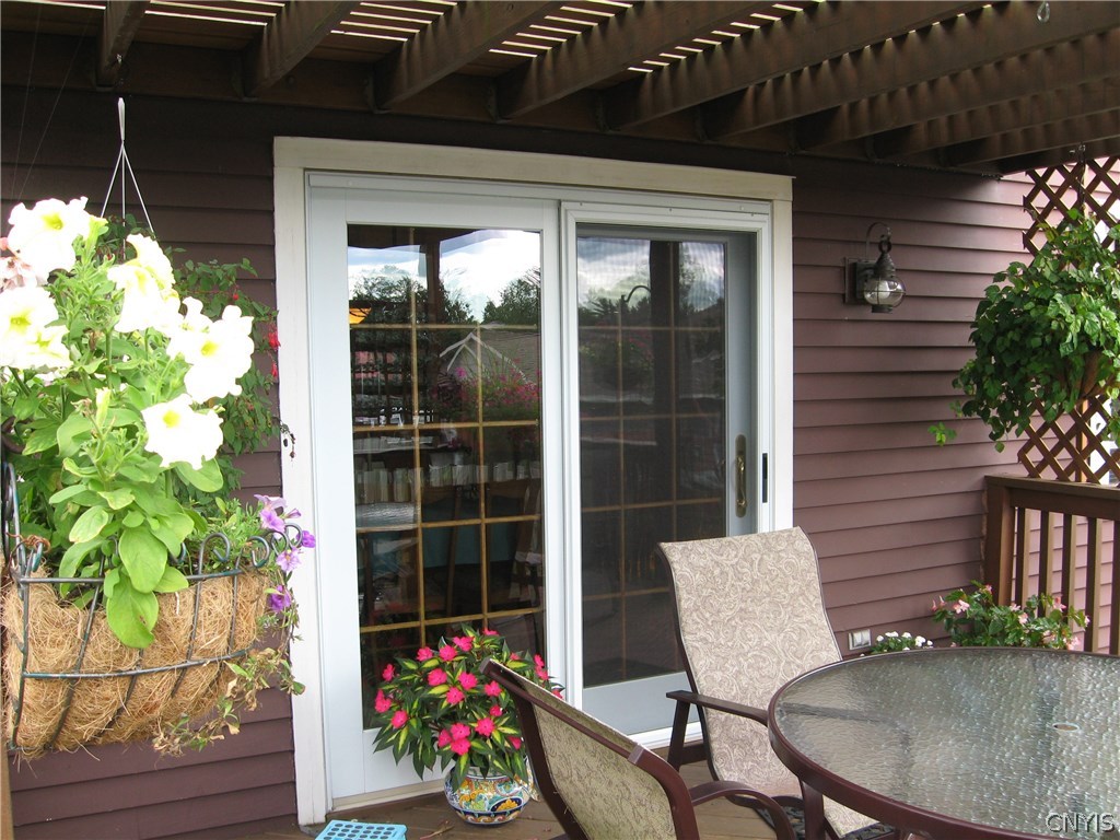 7989 Northwood Drive Rome, NY 13440 - Photo 26 of 30 Patio door from dining room to deck/pergola that o
