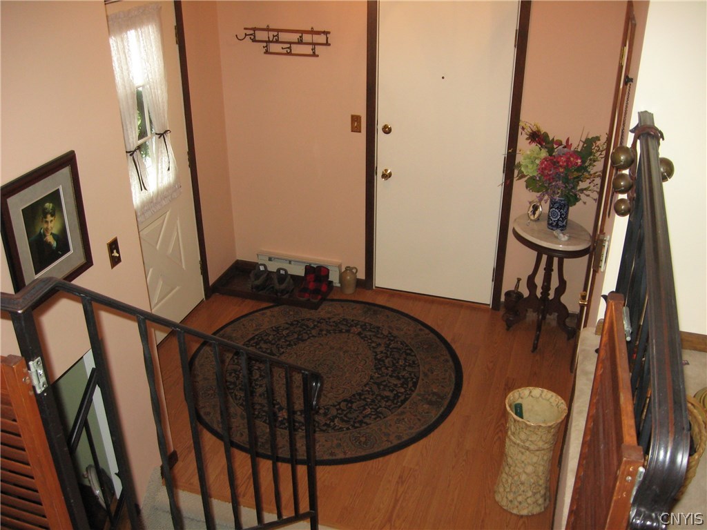 7989 Northwood Drive Rome, NY 13440 - Photo 4 of 30 Front entry hall with closet and door to garage