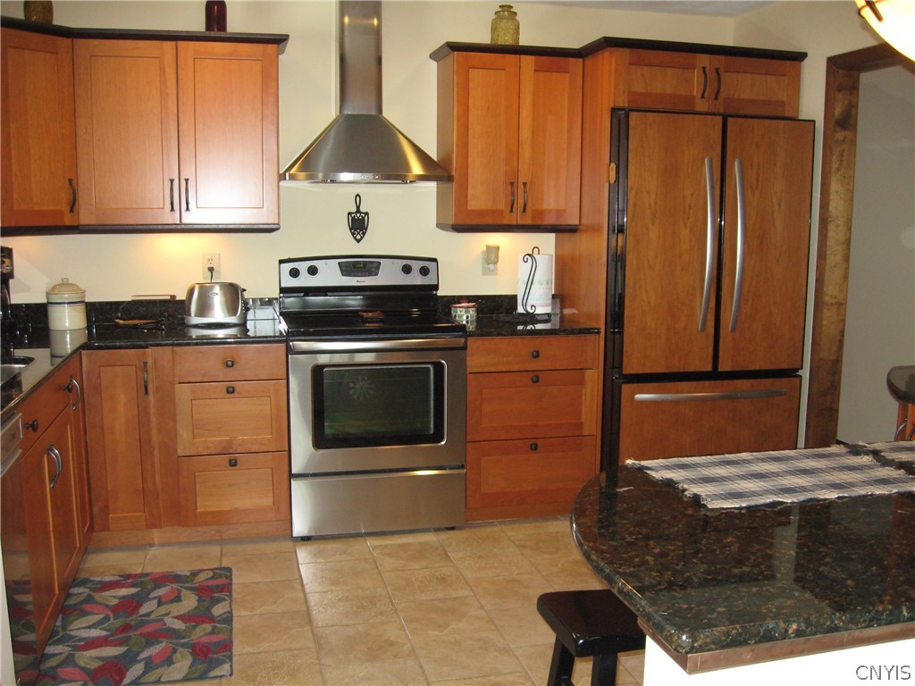 7989 Northwood Drive Rome, NY 13440 - Photo 5 of 30 Wood-Mode custom cherry cabinets, granite counter