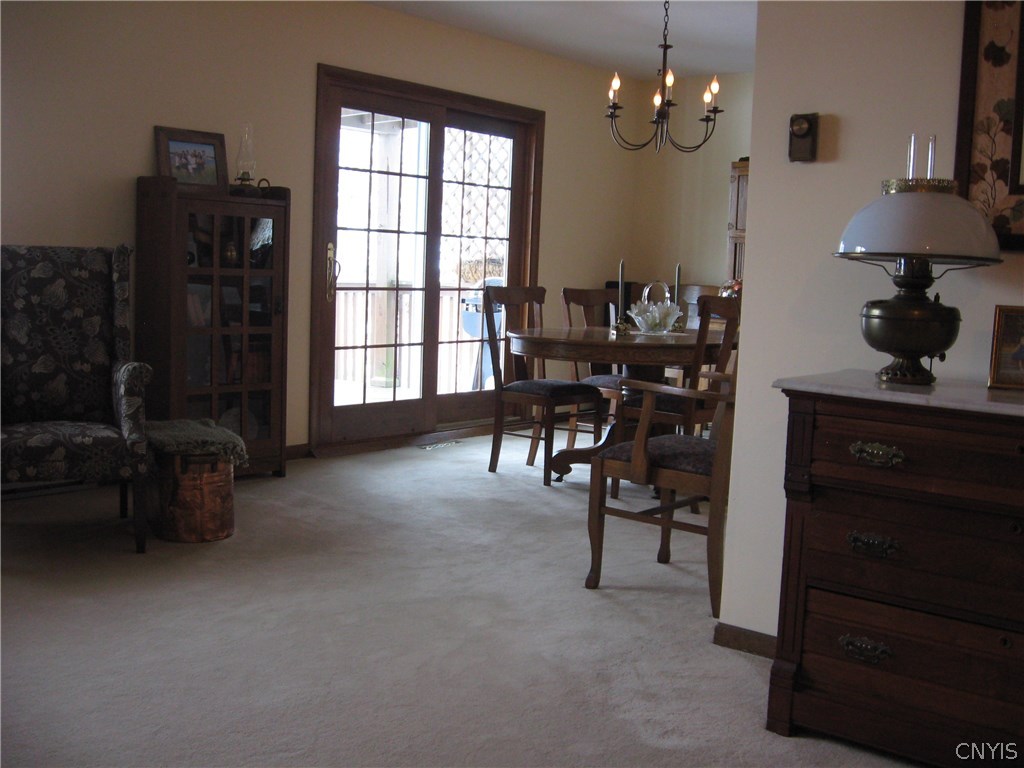 7989 Northwood Drive Rome, NY 13440 - Photo 9 of 30 Formal Dining leads to deck/pergola