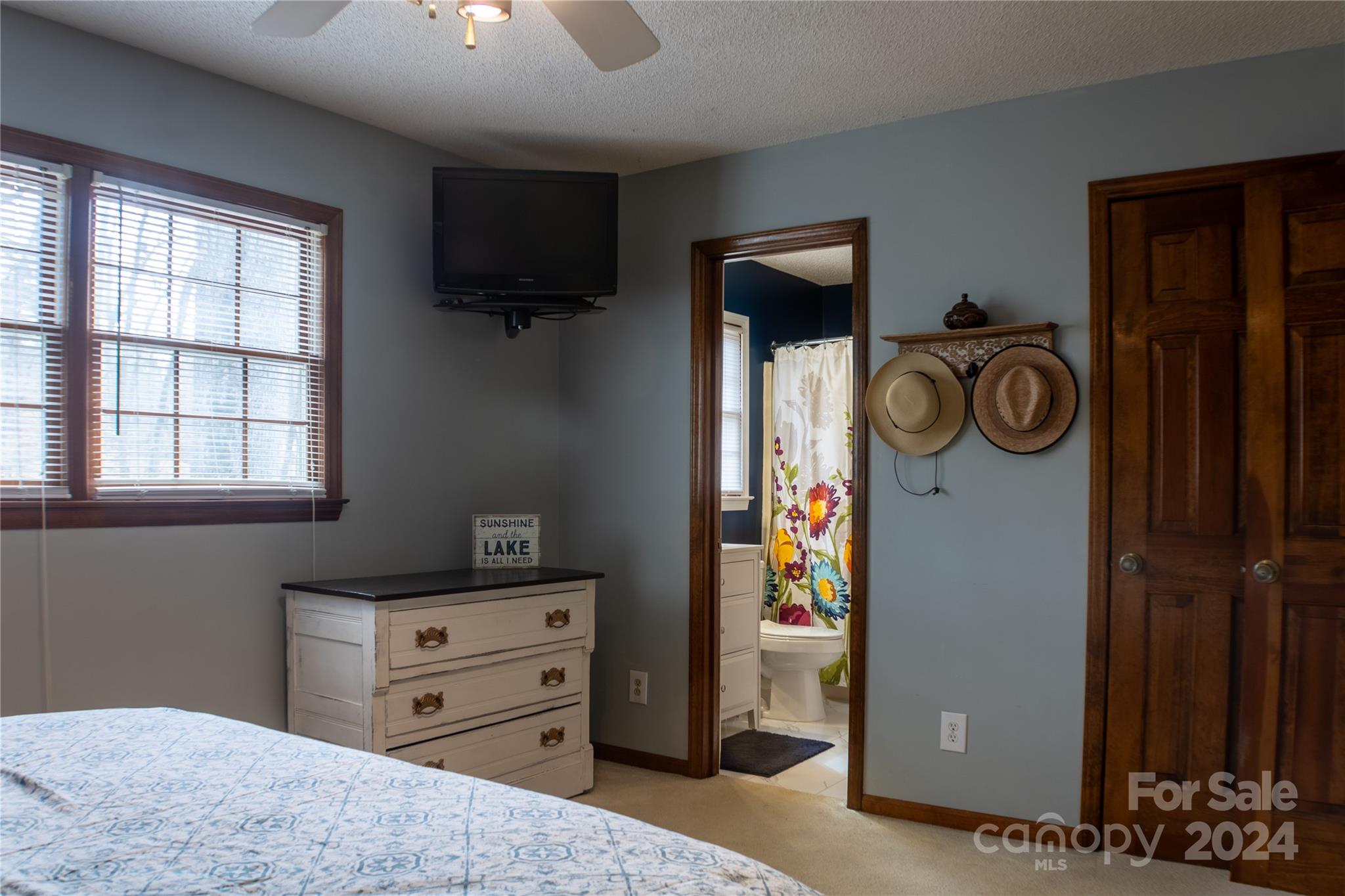 281 Jubal Reeves Circle, Unit 1465 Mount Gilead, NC 27306 - Photo 12 of 17 a bedroom with a bed and a window