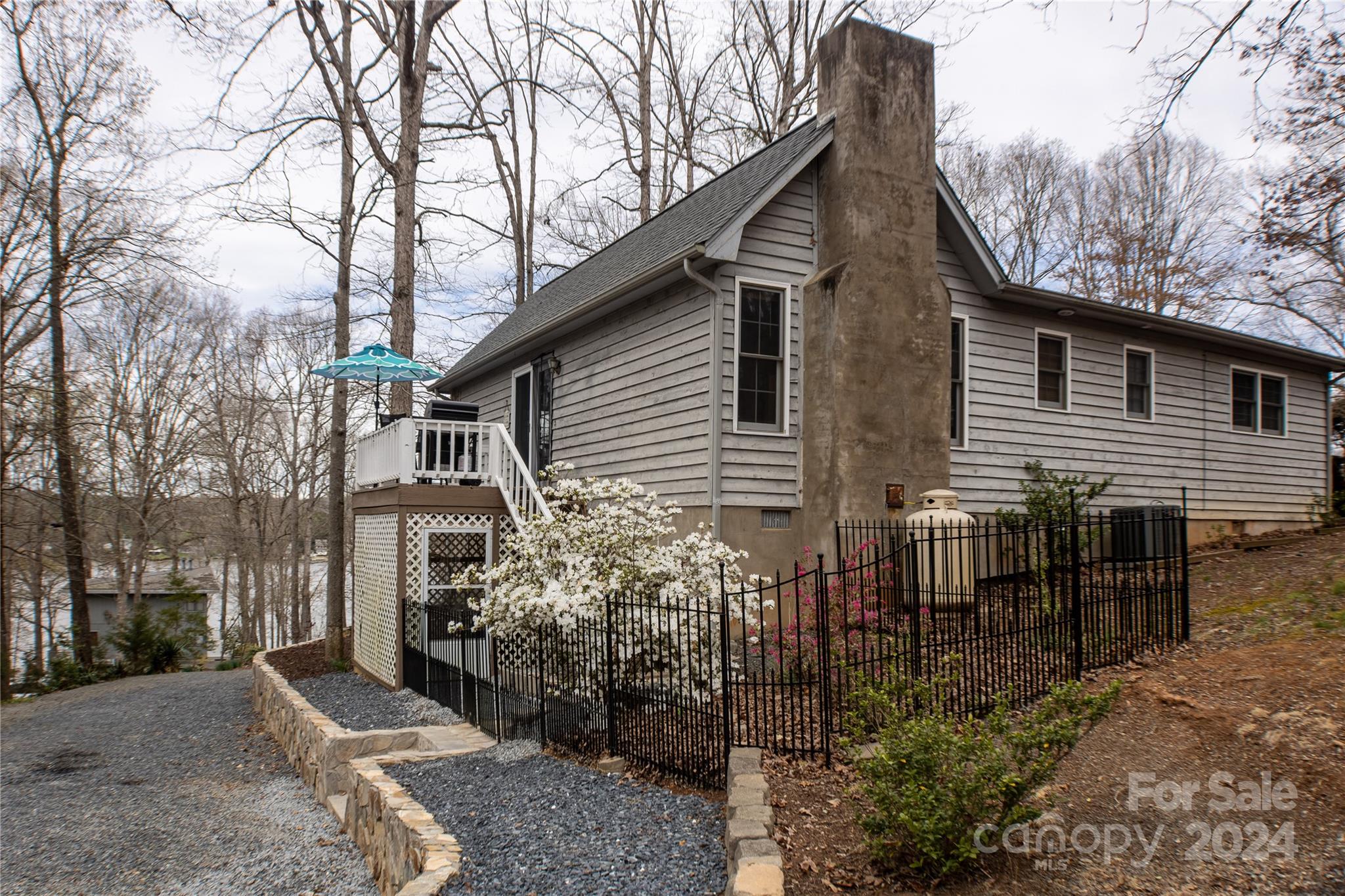 281 Jubal Reeves Circle, Unit 1465 Mount Gilead, NC 27306 - Photo 16 of 17 a view of a house with a yard and sitting area