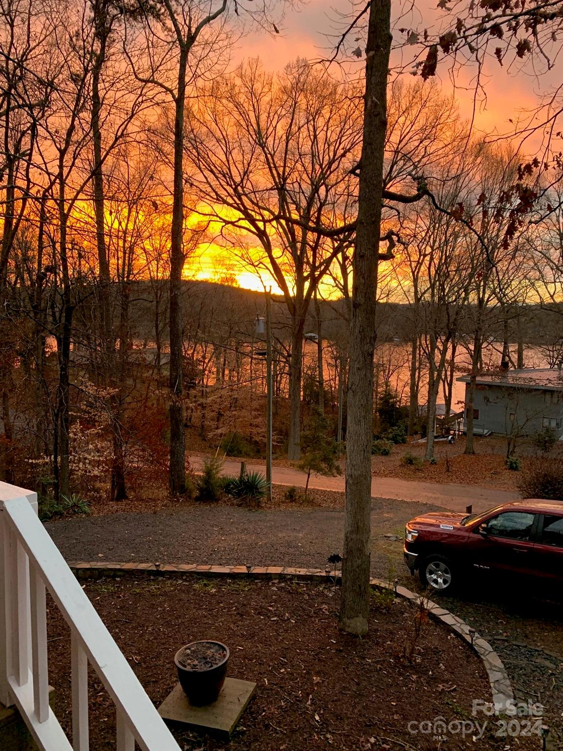 281 Jubal Reeves Circle, Unit 1465 Mount Gilead, NC 27306 - Photo 17 of 17 a view of a street with trees on both side of it