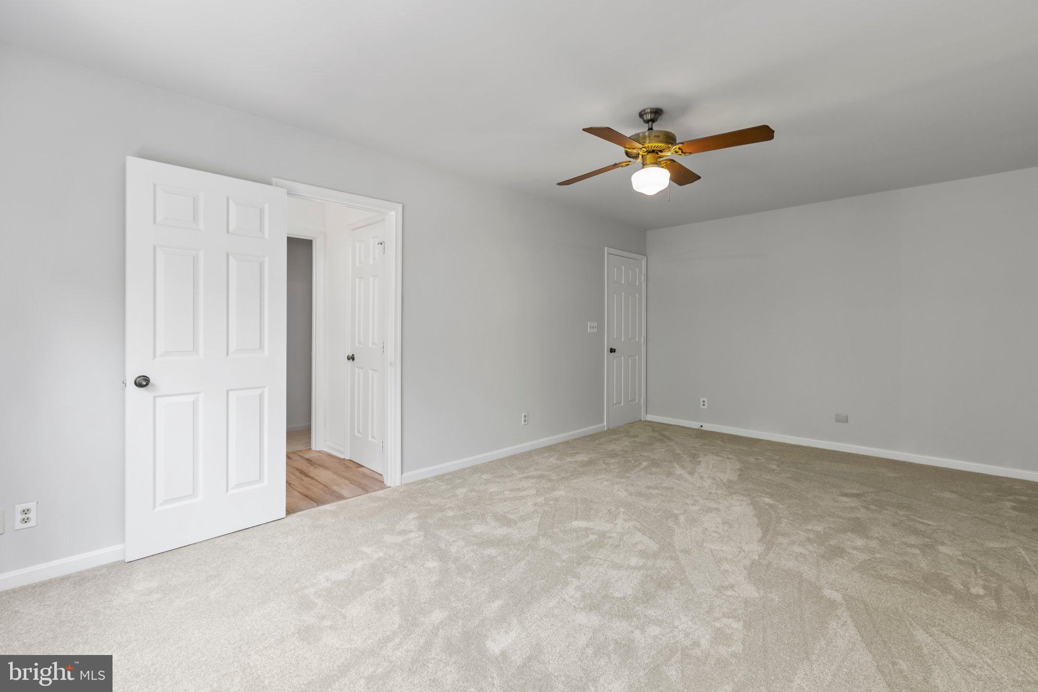235 Choptank Road Stafford, VA 22556 - Photo 29 of 46 Primary Bedroom enter into primary bathroom