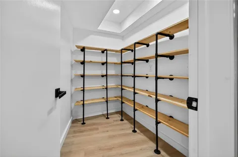 a view of a storage & utility room with stairs