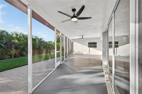 a view of an empty room with a sliding door