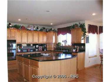 7176 Forestgate Road Colorado Springs, CO 80908 - Photo 4 of 13 Gallery Image 4